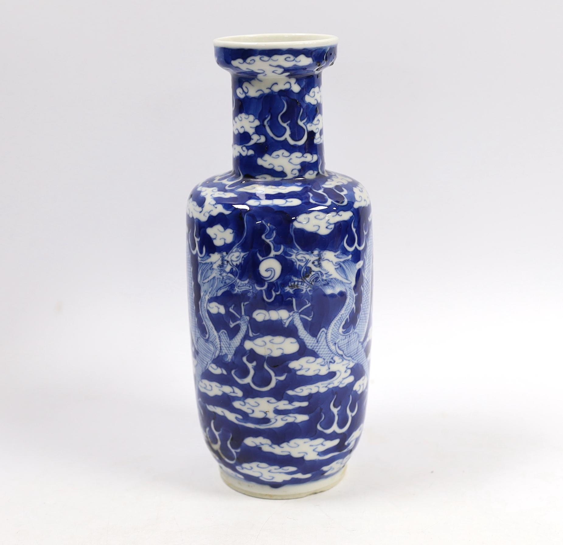 A Chinese blue white ‘dragon’ rouleau vase, Kangxi mark, late 19th century, 21cm high